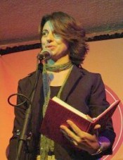 cheryl reading and grinning lightened